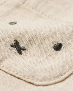 nijntje newborn jumpsuit linnen zand