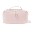 toilettas met diagonale rits 24x12x12cm roze